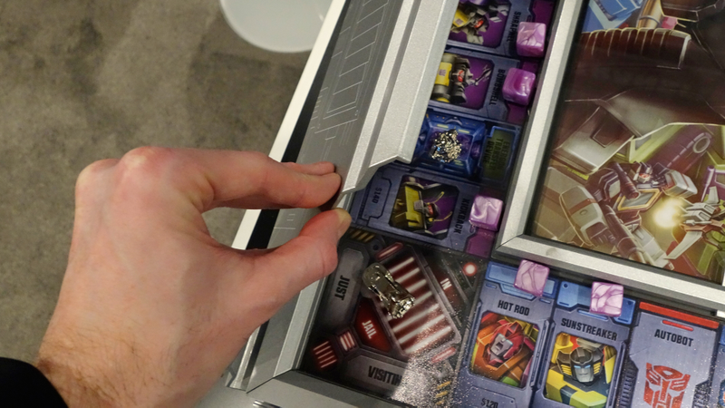 Illustration for article titled Transformers Monopoly Is a Work of Art You Can Actually Hang on a Wall